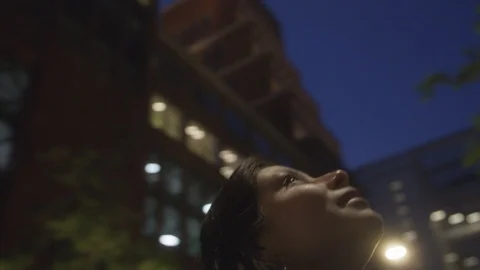 Den Haag Hague Pack 2 | woman looking up in the sky watching building in night Vídeo Stock 116193527