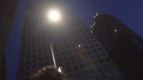 Den Haag Hague Pack 4 | woman walking in street city night skyscraper buildings Stock Footage 116193571