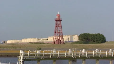 Den Oever Lighthouse, a cast iron lighthouse, Wadden Sea, The Netherlands Stock Footage 42940339