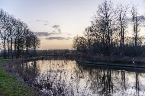 The Dender river at sunset Stock Photos