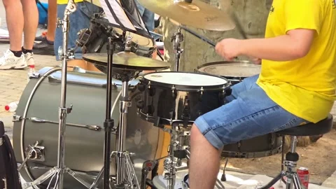 DENIA, SPAIN - AUGUST 9, 2026: Drummer playing snare drum and cymbals at outdoor Stock Footage 343797027