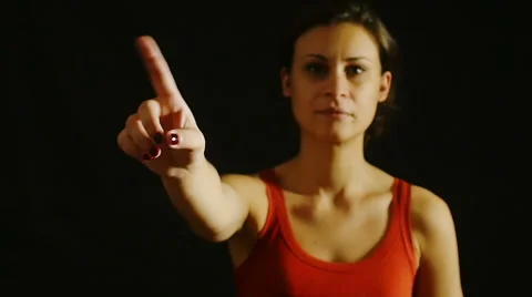 Denial gesture made by young cute girl on black background: finger, no, denial Video stock 42430662
