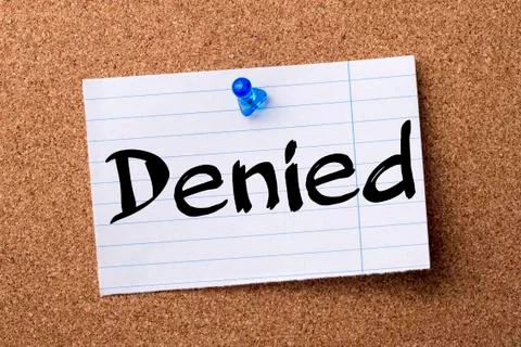 Denied - teared note paper pinned on bulletin board Stock Photos