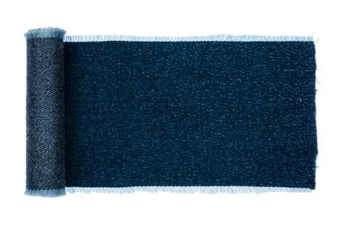Denim frame folded in the form of manuscripts,scroll isolated on white backgr Fotos de archivo