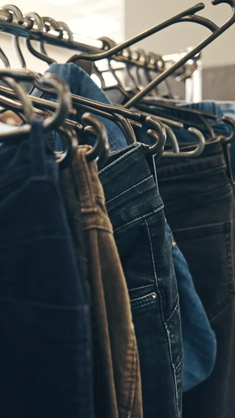Denim Jeans Hanging In Second Hand Shop Stock Footage 339087612