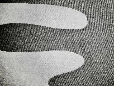 Denim textile weave macro captures organic flowing shape on durable monochr.. Stock Photos
