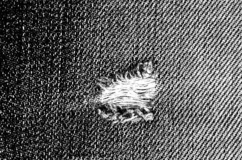 Denim texture with the effect of aging Stock Photos