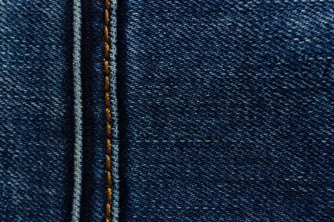 Denim texture with seam Stock Photos