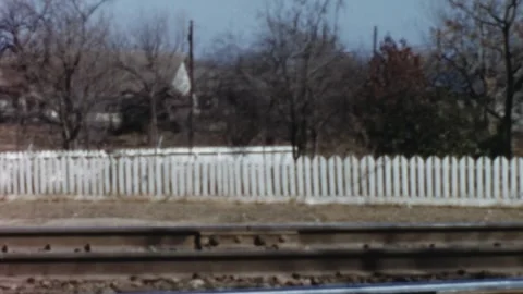 DENISON - 1956 - The camera frames Eisenhower�s birthplace across the train Stock Footage 340586092