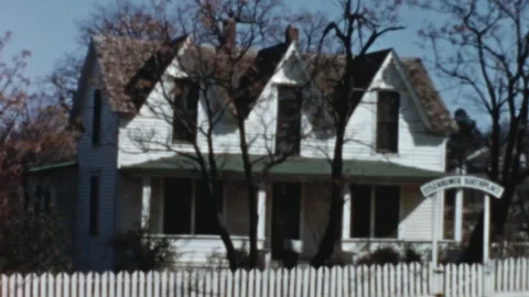 DENISON - 1956 - View of Dwight D. Eisenhower�s birthplace as a train passes Stock Footage 340586096