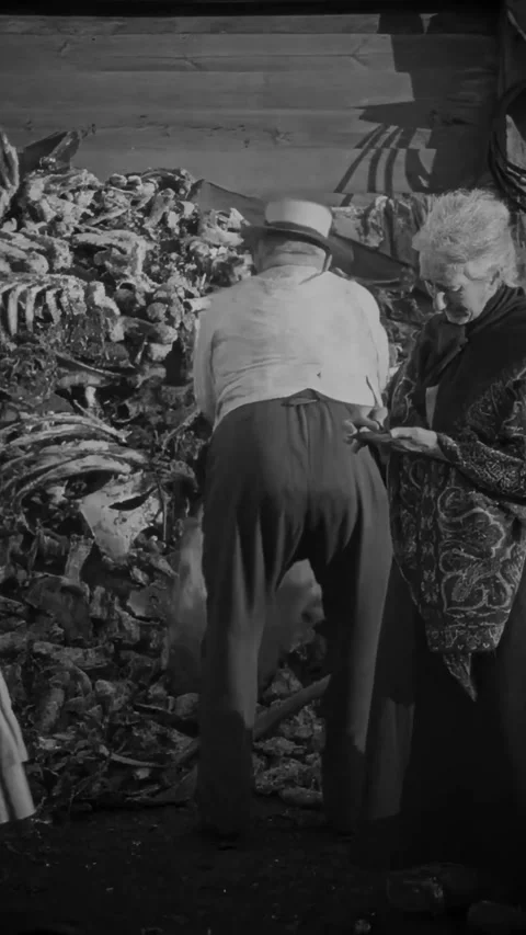 DENMARK - 1925 - in this silent drama, a man pays a woman for some trash, which Stock Footage 339780427