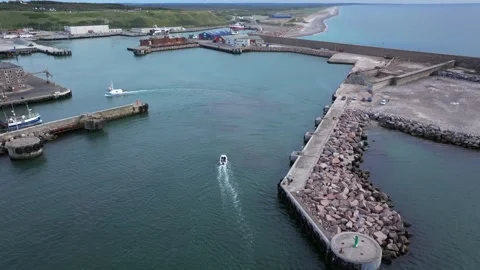 Denmark Aarhus- 12 26 2021: Aerial, Ship sailing into the The Port at sunset, Dr Stock Footage 259314029