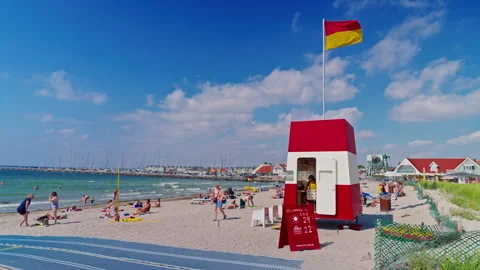 Denmark - August 14, 2025: A hot summer beach day on the Danish coast Stock Footage 320806194