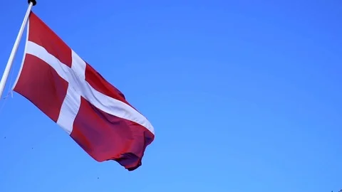 Denmark flag waving on wind  with clear blue sky background. 스톡 동영상 99877420