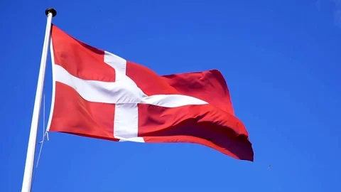 Denmark flag waving on wind  with clear dark blue sky background. Stock Footage 99878013
