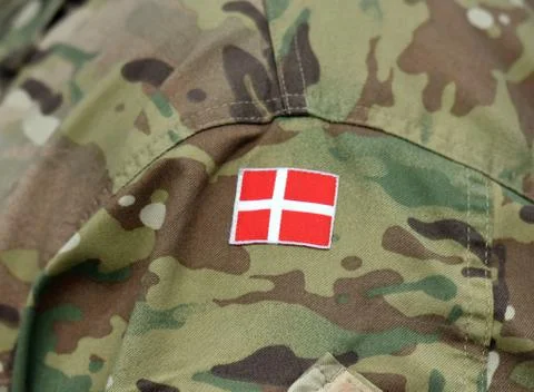 Denmark patch flag on soldiers arm. Denmark military uniform. Danish troops Fotos de archivo