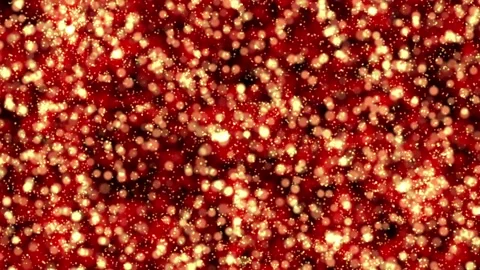 A dense accumulation of red-orange particles shimmers with a golden glow. Stock Footage 164571191