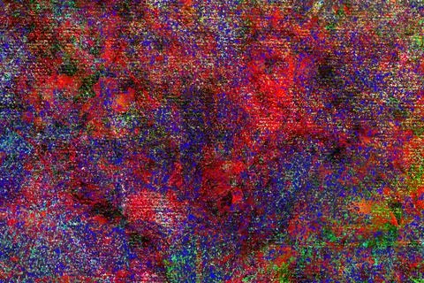 A dense and saturated red-based abstract texture speckled with blue and green Stock Photos