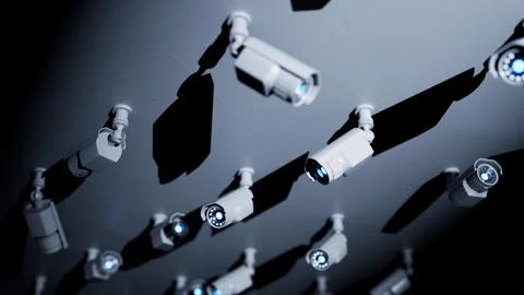 A dense array of surveillance cameras continuously loops the footage. Video stock 336044287