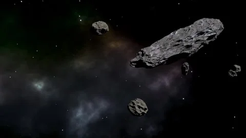 Dense asteroid field floating in deep space with colorful nebula background Stock Footage 317838644