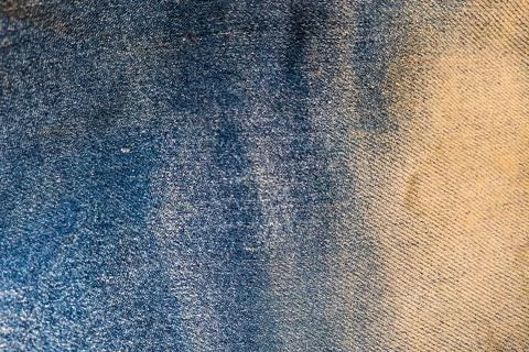 A dense background backdrop texture of indigo blue cotton denim jeans fabri.. Stock Photos