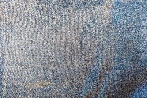A dense background backdrop texture of indigo blue cotton denim jeans fabri.. Stock Photos