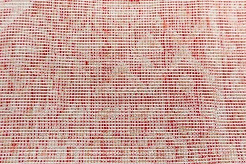A dense background backdrop texture of a premium woven loop rug, under unif.. Stock Photos