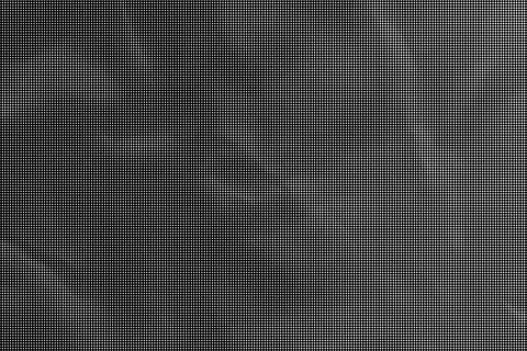 Dense black halftone dot pattern background texture in grayscale black dots  イラスト素材