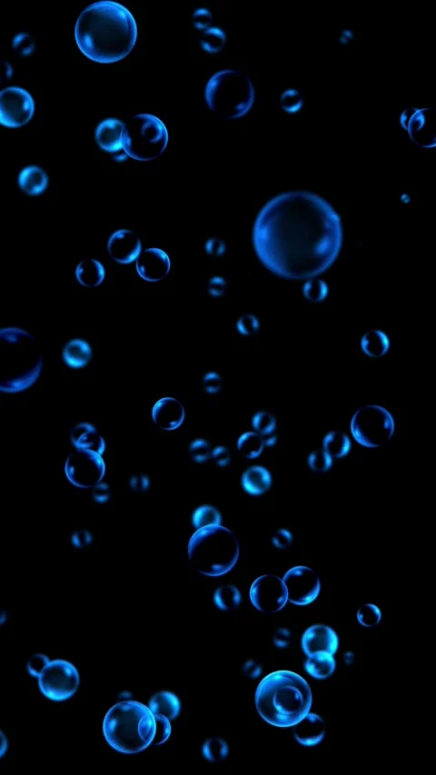 Dense blue bubbles float upwards on a black background, vertical format Stock Footage 340146361