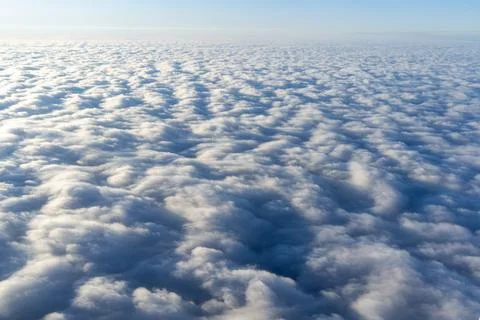 Dense cloud texture from airplane above clouds minimal sky background Fotos Stock