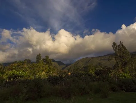 Dense clouds over the central Andean range of Colombia, near the colonial tow Stock Photos
