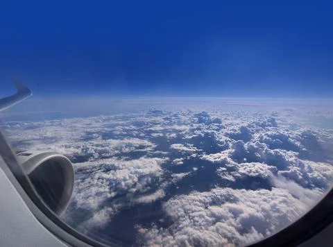 Dense Clouds from the plane window Stock Photos