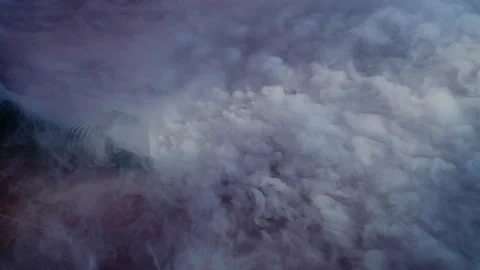 Dense clouds of smoke from a smoke machine creating a dramatic effect at Stock Footage 278657424