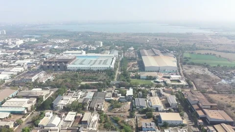 A dense collection of workshops storage depots and large-scale factory units Stock Footage 332161576