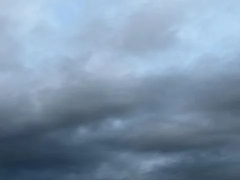 Dense Dark Rain Clouds Filling Stormy Sky Stock-Fotos
