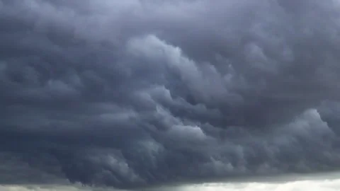 Dense dramatic storm clouds filling the sky Video stock 337790915