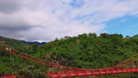 Dense  ever-changing fluffy cloudscape and light shadow on the mountain top. Stock Footage 277952379