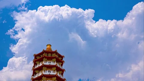 Dense  ever-changing fluffy cloudscape on the Chinese Tower top. Stock Footage 280146084