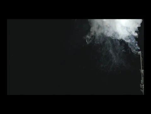 Dense Fiery Smoke Blast Compositing Element against Black Stock Footage 335380213