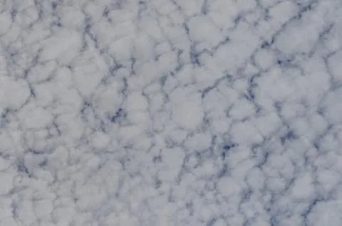 Dense fleecy clouds in the summer Stock Photos