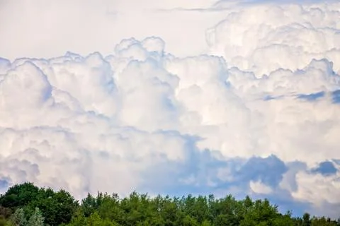 Dense fluffy clouds Stock Photos