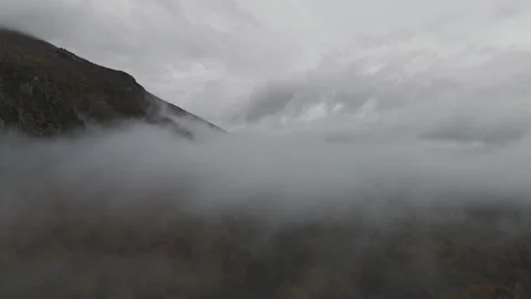 Dense Fog And Clouds Above The Mountain Forest In The Evening Stock Footage 321822398