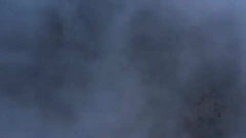 Dense fog and clouds obscure the landscape creating mysterious atmospheric Stock Footage 342705381