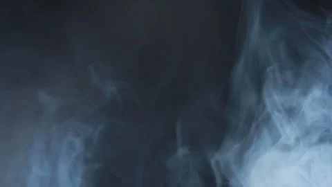 Dense fog clouds drifting dark background. Abstract smoke texture cold tones. Stock Footage 345682176