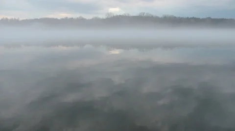 Dense fog on river with forest in the background (FULL HD) Video stock 37015773