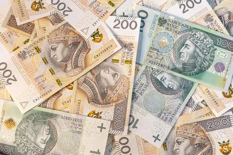 Dense Full-Frame Background of Polish Money and Zloty Banknotes Foto stock