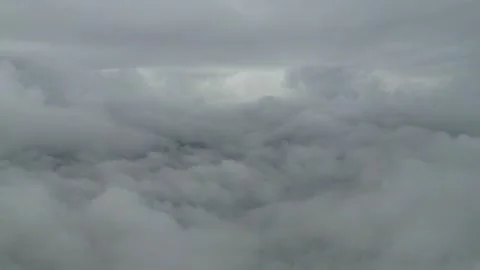 Dense gray clouds rolling across the sky, creating a dramatic atmospheric scene Vídeos de archivo 340393195