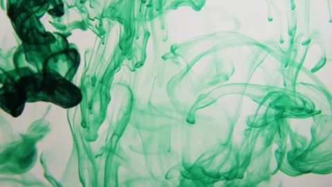 Dense green ink clouds swirl through water filling frame Stock Footage 329667629