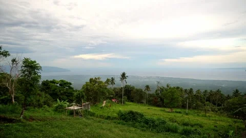 Dense green rainforests high in the mountains, a view of the settlement, the Stockbeeldmateriaal 272506743