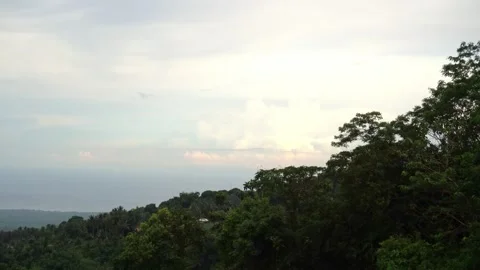 Dense green rainforests high in the mountains, a view of the settlement, the 스톡 동영상 272508012